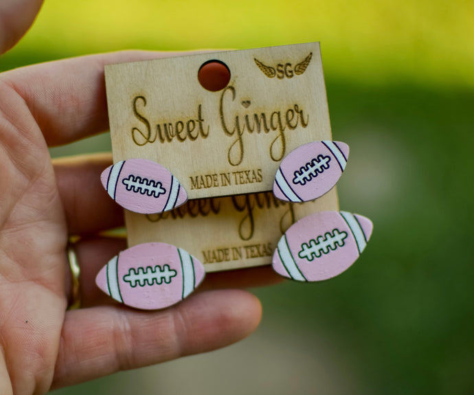 Pink out football studs