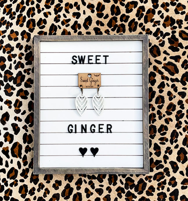 White Upside Down Scrolls